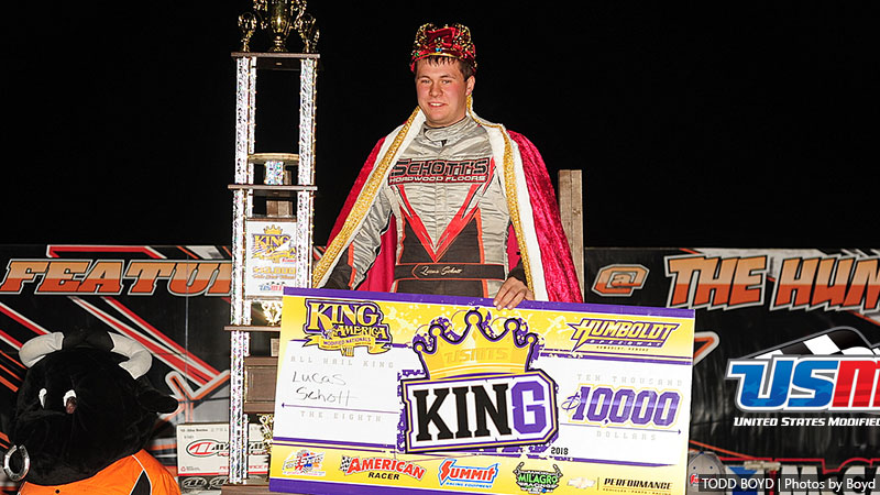 Schott wears King of America VIII crown