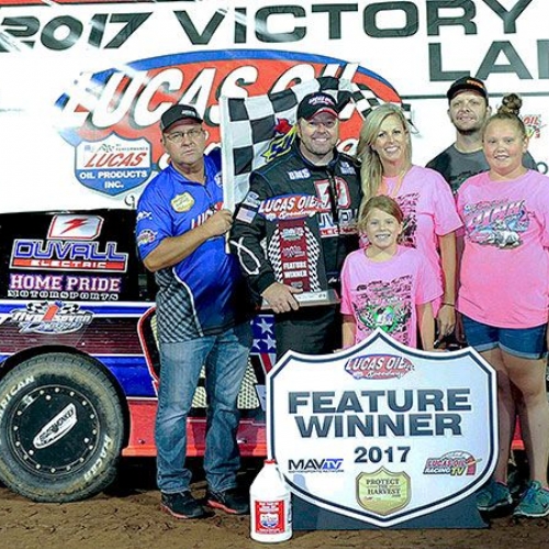 Joe celebrates in victory lane with family and friends after winning the USRA Modified feature at the Lucas Oil Speedway in Wheatland, Mo., on Thursday, June 29, 2017.
