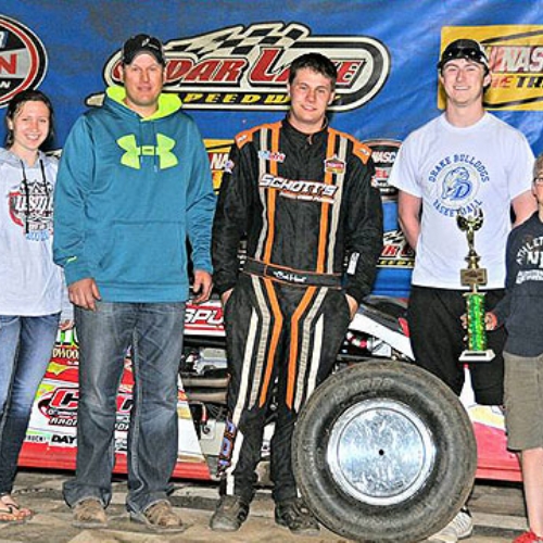 Celebrating in victory lane with family and crew members at the Cedar Lake Speedway in New Richmond, Wis., on Saturday, April 16, 2016.